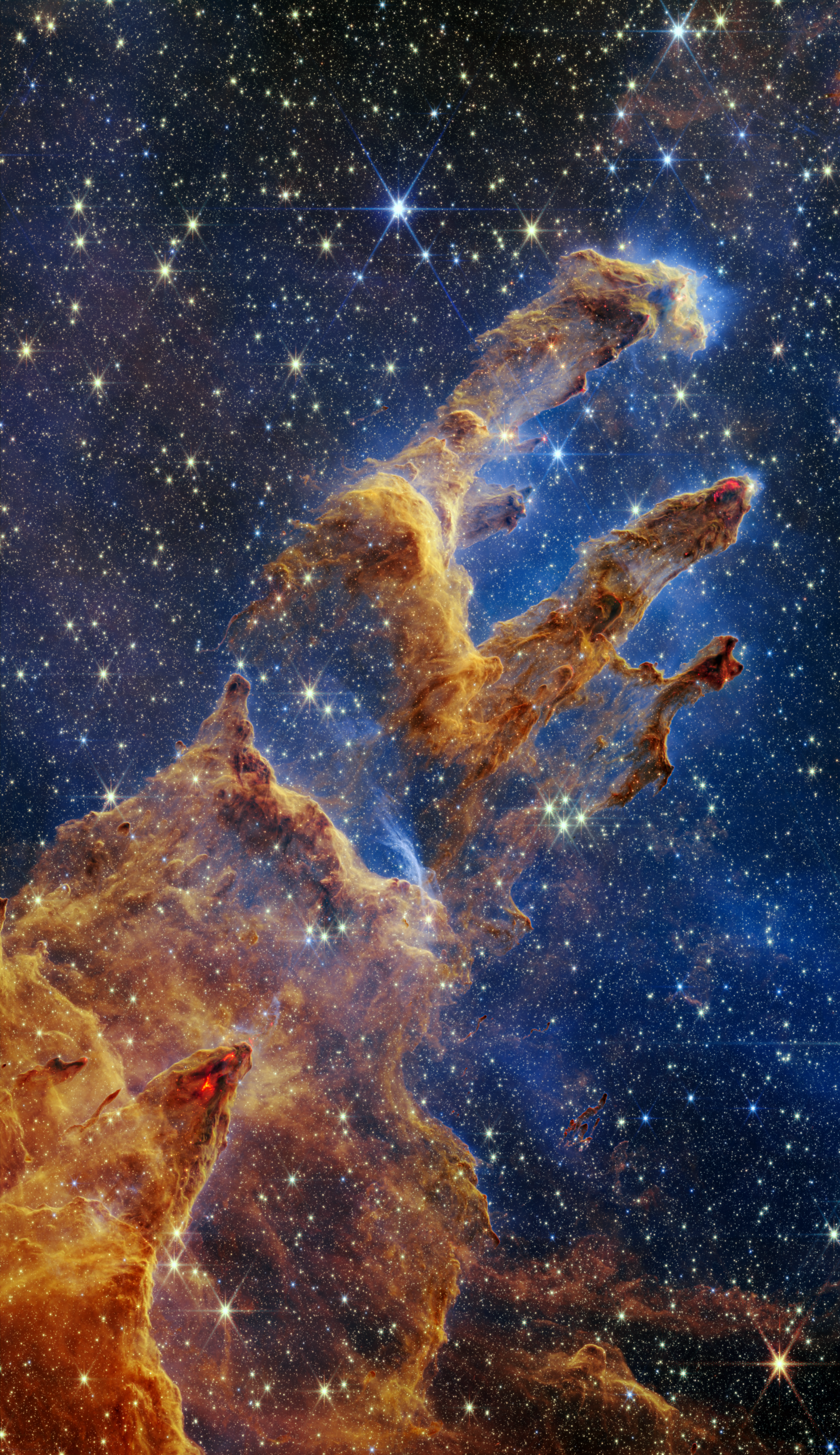 Pillars of Creation (JWST) aan de muur in een interieur